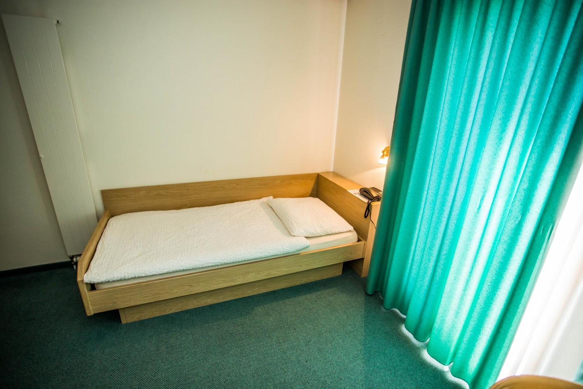 Hotel Olympica Brig Pokoj fotografie