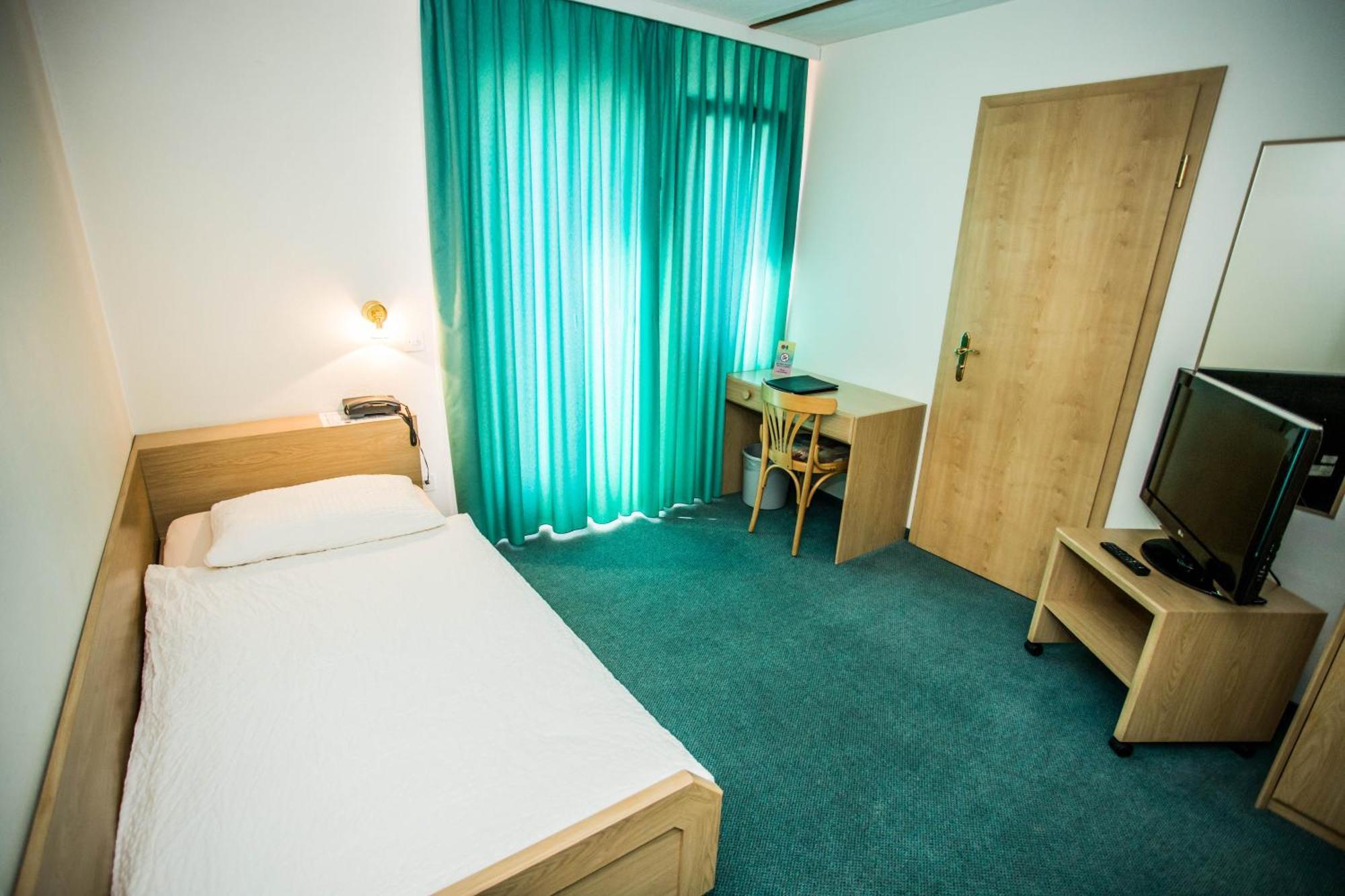 Hotel Olympica Brig Pokoj fotografie