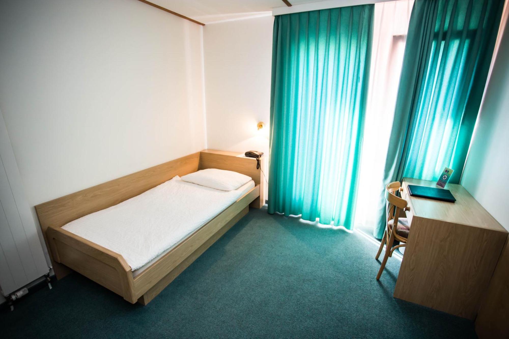 Hotel Olympica Brig Pokoj fotografie